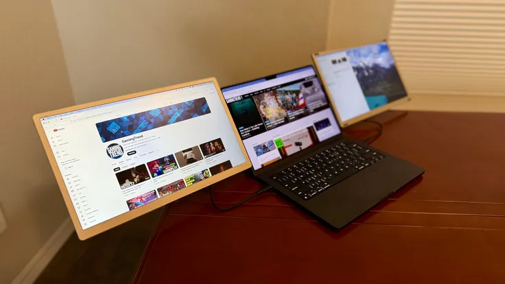 Enzion S6 portable monitors mounted to a MacBook Pro 14